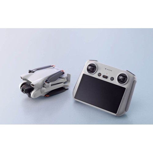 Белый дрон DJI Mini 3 с пультом управления DJI RC.